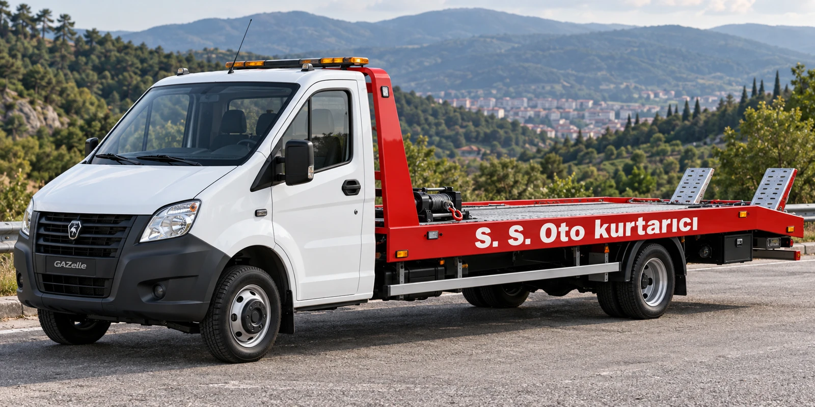 Beyaz kabinli kırmızı kasalı S. S. Oto kurtarıcı Gazelle çekici